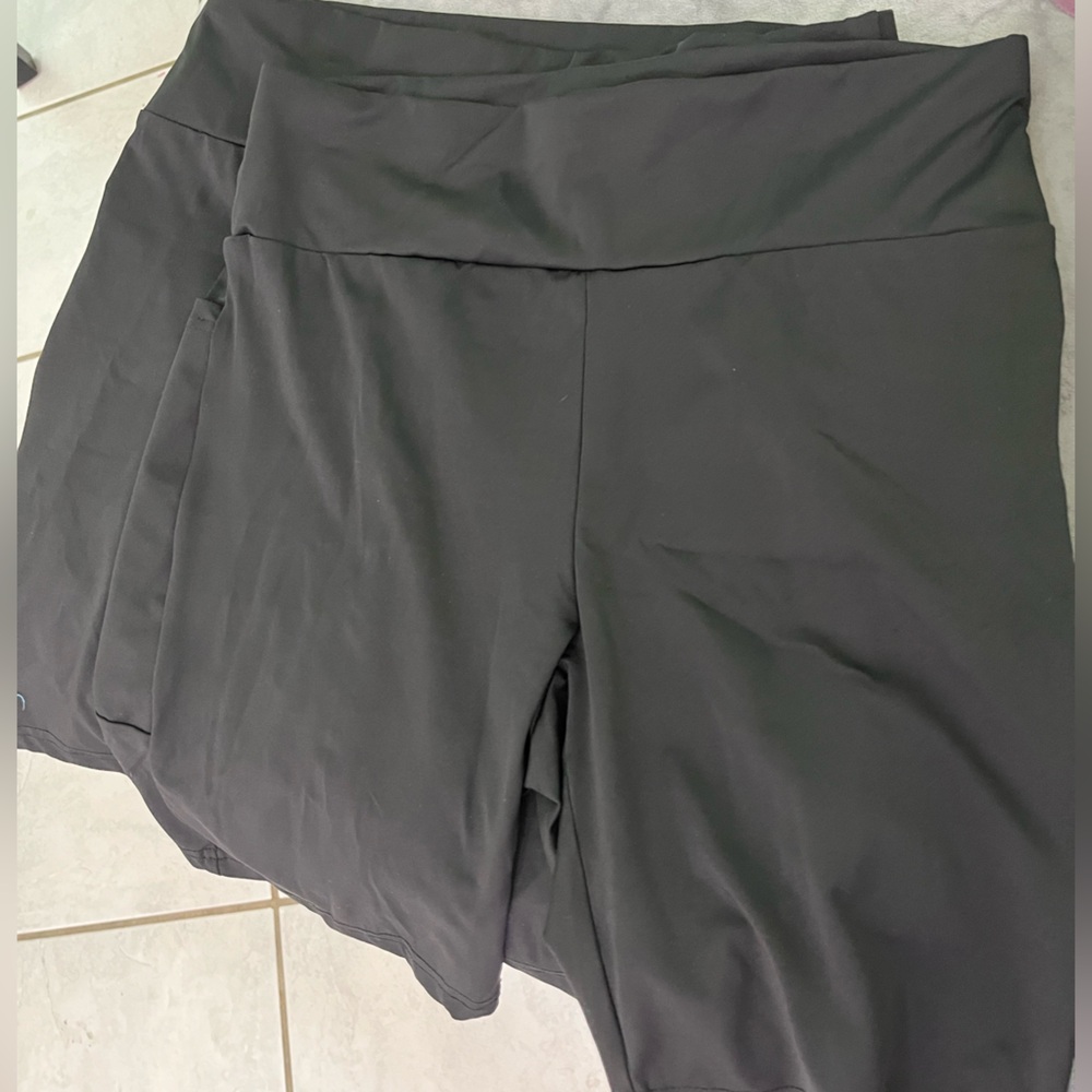 Two pairs of biker shorts with pockets
